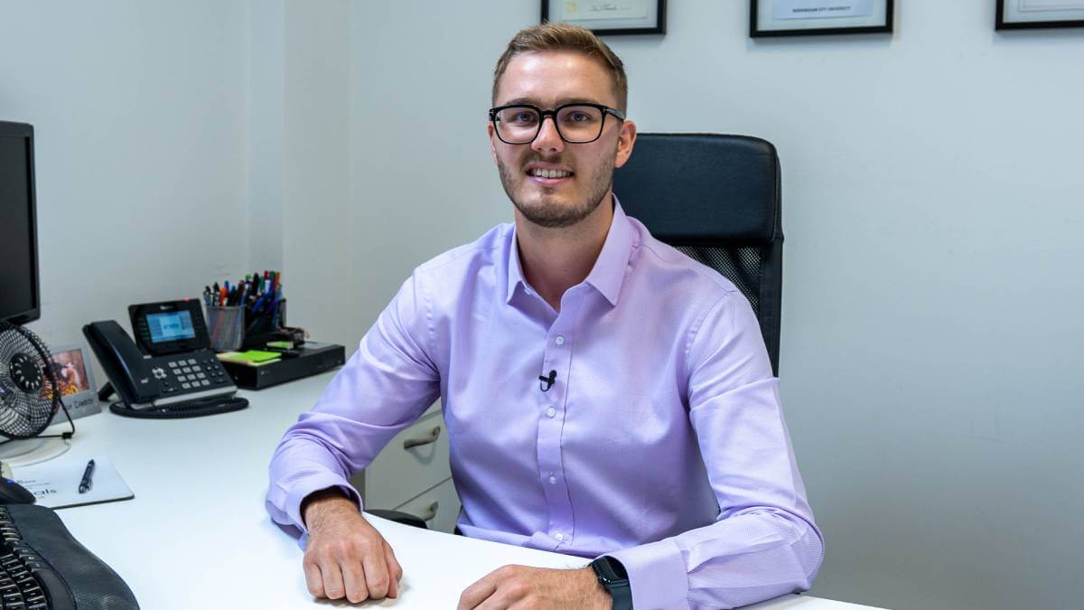 Harrison At His Desk